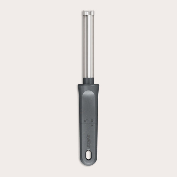 The Zyliss Apple Corer is a sleek stainless steel tool with an eco-friendly handle, a serrated circular blade for easy coring, and a hanging hole for convenient storage. 