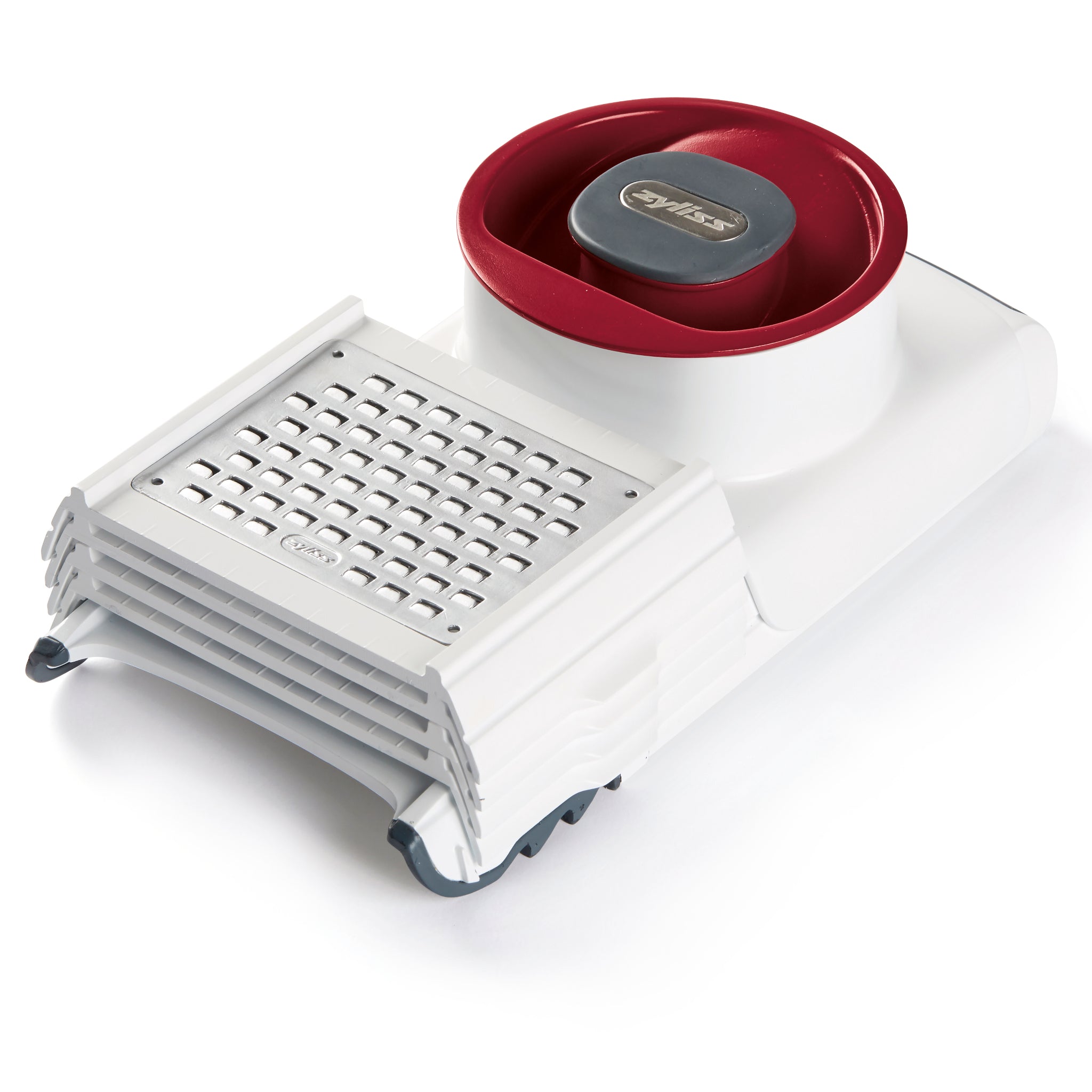A white and red kitchen mandoline slicer with a hand guard and adjustable slicing platform, designed for safely slicing vegetables.