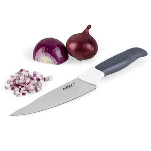 The Zyliss Comfort Utility Knife 13cm / 5 with an ergonomic handle and stainless steel blade lies next to a whole red onion, a halved onion, and diced pieces on a white background. 