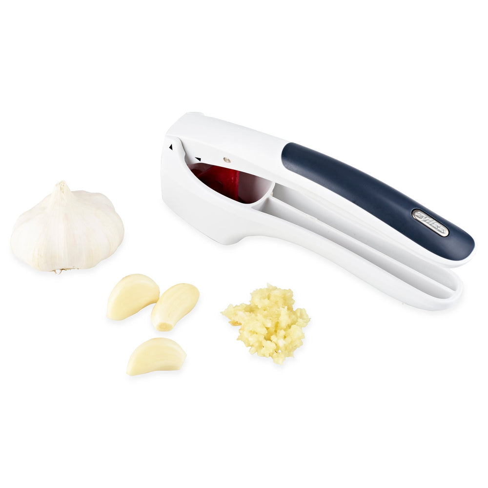 The Zyliss Easy Clean Garlic Press, featuring ergonomic white and gray handles with a soft grip, is displayed on a light gray background. 