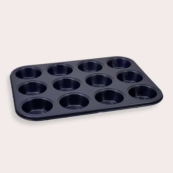 A Zyliss Durable Non-Stick 12 Hole Muffin Pan in black is displayed on a plain light background.