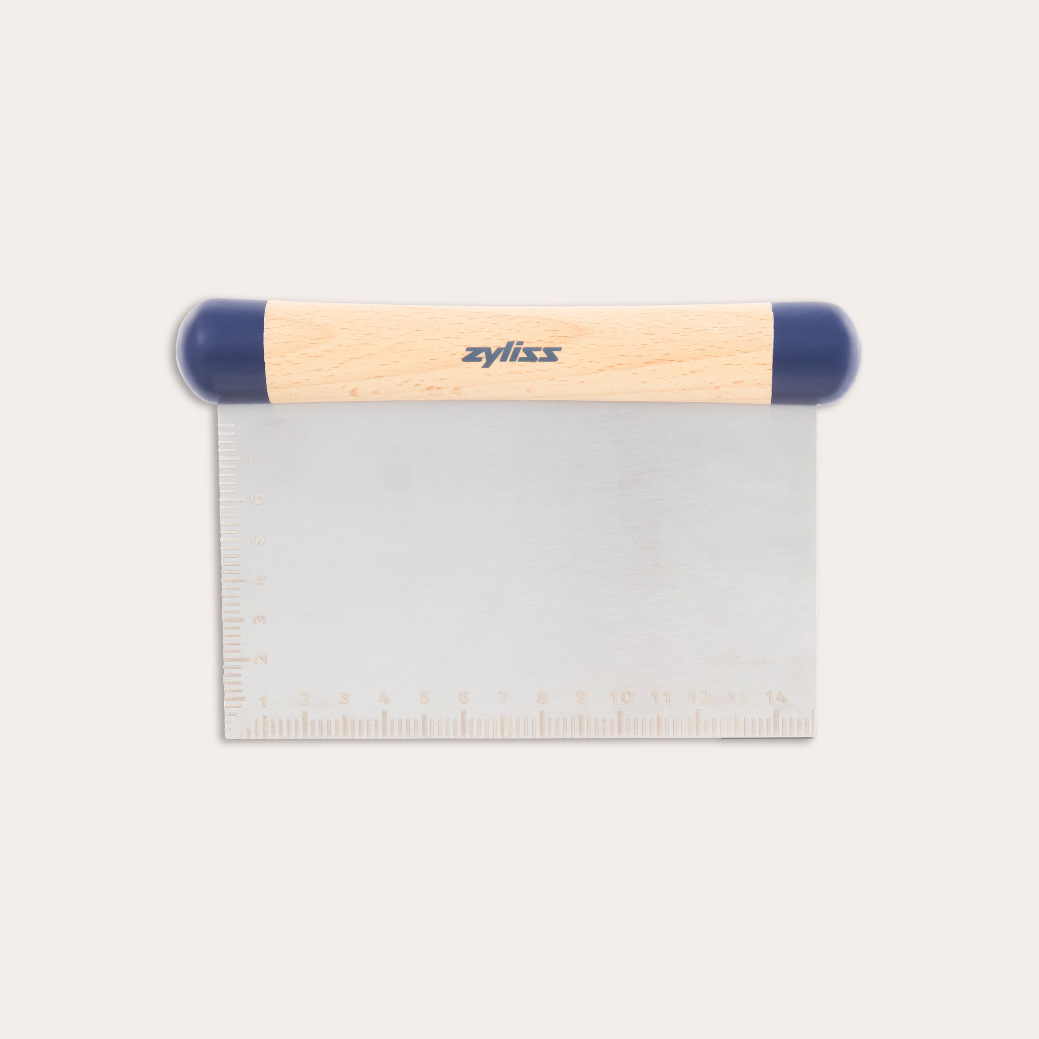 The Zyliss Beech Wood Bench Scraper features a beech wood handle, blue plastic ends, and a metal blade with an etched ruler—a versatile tool for baking tasks. 