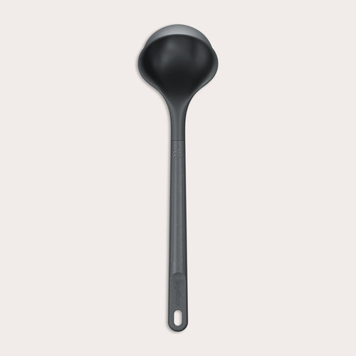 #medium A Zyliss Ladle in black with a long handle and deep, rounded bowl is displayed against a plain white background. #Medium