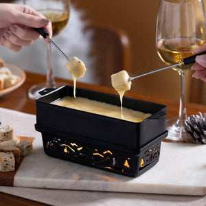 Zyliss Tandem Candlelight Fondue & Raclette Set — in use