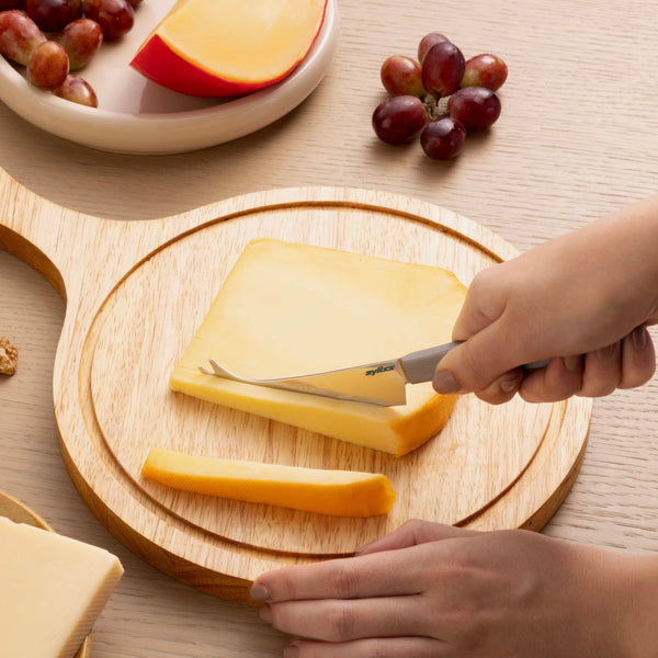Zyliss Signature Universal Cheese Knife 100mm/3.9in — in use
