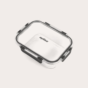 #1.05L/1.1qt 
A rectangular clear Zyliss Glass Container for meal prep features a transparent lid with four black locking clips, Zyliss printed in black on the lid, all shown against a plain light background. 