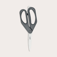 A pair of Zyliss Household Scissors with eco-friendly black handles and stainless steel blades shown against a plain light background.
