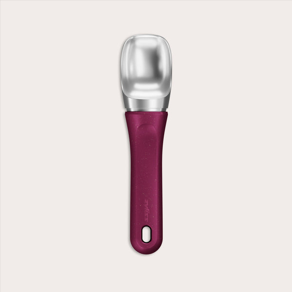 #berry The Zyliss Ice Cream Scoop features a wide, flat stainless steel scoop and an eco-friendly handle, displayed against a plain light background.