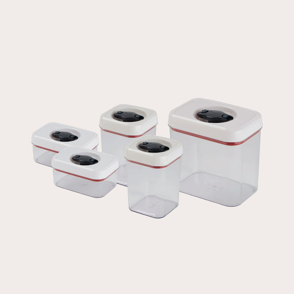 The Zyliss Twist & Seal 5 Piece Container Set features transparent plastic containers in various sizes with white twist-lock lids and black buttons, ideal for versatile kitchen storage. 