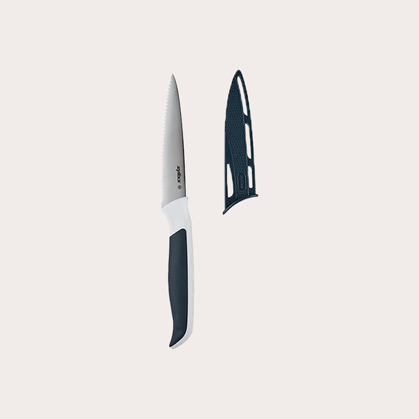 The Zyliss Comfort Serrated Paring Knife 10.5cm / 4¼ features a black and white handle and includes a matching black blade cover, ideal for precise control with delicate fruits and vegetables. 