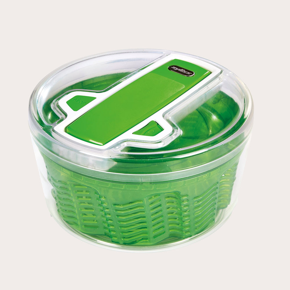 The Zyliss Swift Dry Salad Spinner Large features AquaVent™ technology, a green inner basket, matching green and white lid, and a non-slip base for efficient washing and drying of salad greens. 