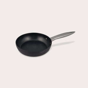 The Zyliss Ultimate Pro Non-Stick Frying Pan With Pouring Lip features a black, Swiss-coated hard-anodized aluminum body and a long gray handle, shown on a plain white background. #20cm/8"