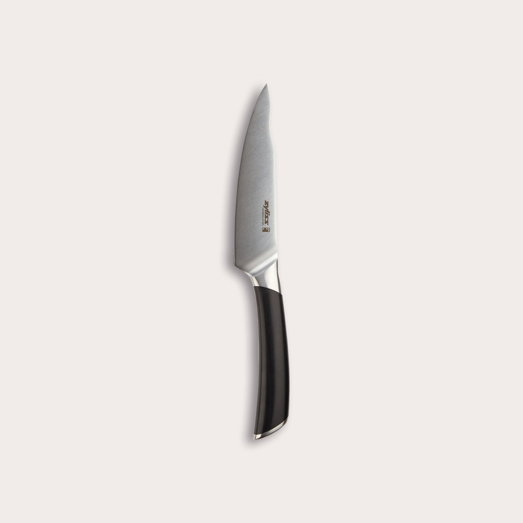 The Zyliss Comfort Pro Utility Knife 14cm (5½) features a sharp German stainless steel blade and a black ergonomic handle, showcased against a plain light background.