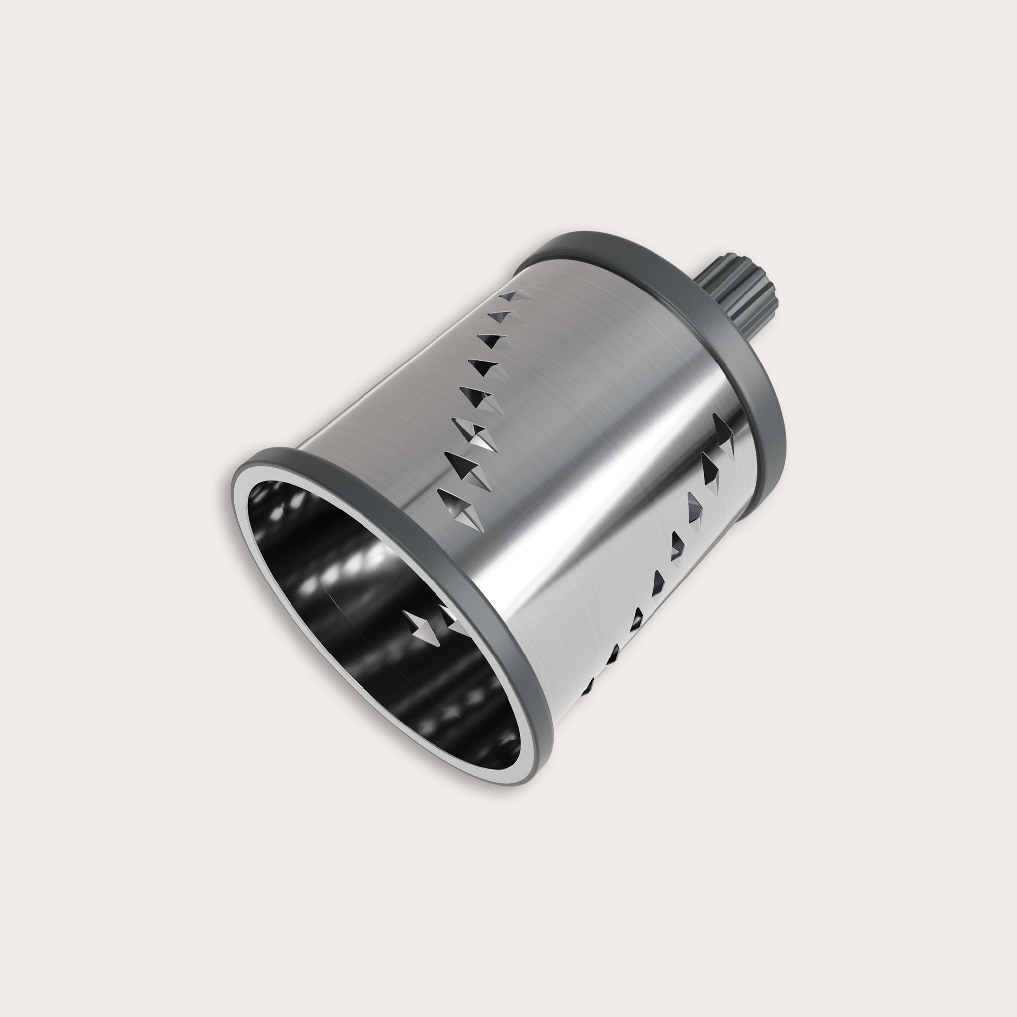 The Zyliss Julienne Drum Gourmet is a metal cylindrical tool with sharp stainless steel blades and a plastic gear attachment, shown against a plain light background. 